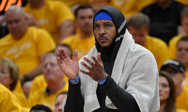 SALT LAKE CITY, UT - APRIL 21: Carmelo Anthony #7 of the Oklahoma City Thunder cheers from the benc...