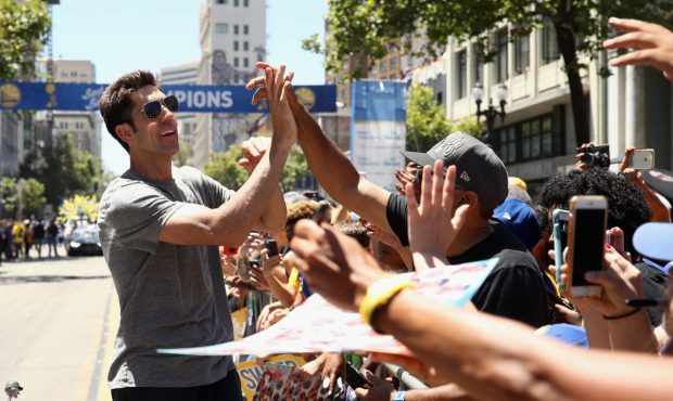 OAKLAND, CA - JUNE 12: General manager Bob Myers of the Golden State Warriors celebrates with the c...