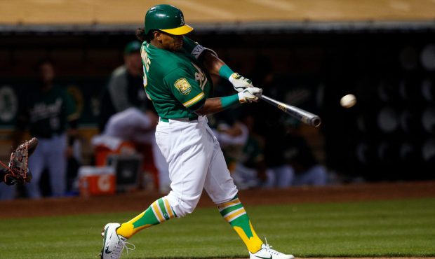 OAKLAND, CA - JUNE 29:  Khris Davis #2 of the Oakland Athletics hits an RBI double against the Clev...