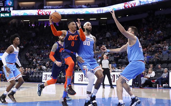 SACRAMENTO, CA - DECEMBER 19:  Russell Westbrook #0 of the Oklahoma City Thunder drives on Willie C...
