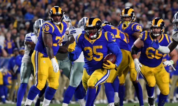 LOS ANGELES, CA - JANUARY 12: C.J. Anderson #35 of the Los Angeles Rams runs with the ball in the f...