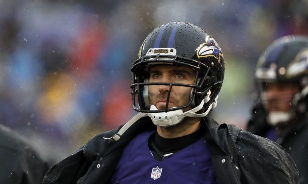BALTIMORE, MARYLAND - DECEMBER 16: Quarterback Joe Flacco #5 of the Baltimore Ravens looks on from ...