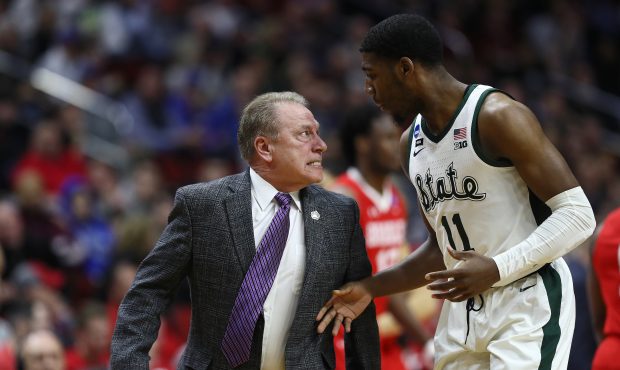 DES MOINES, IOWA - MARCH 21: Head coach Tom Izzo of the Michigan State Spartans glares at Aaron Hen...