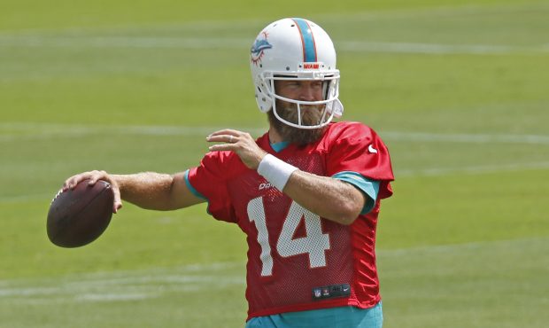 DAVIE, FL - APRIL 17: Ryan Fitzpatrick #14 of the Miami Dolphins throws the ball during the team's ...