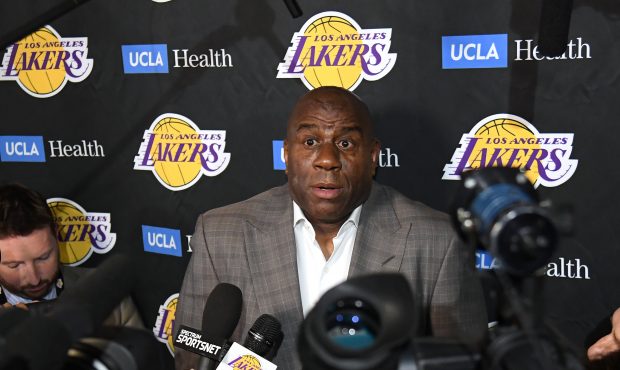 LOS ANGELES, CALIFORNIA - APRIL 09: Magic Johnson reacts as he speaks to the press resigning as Los...