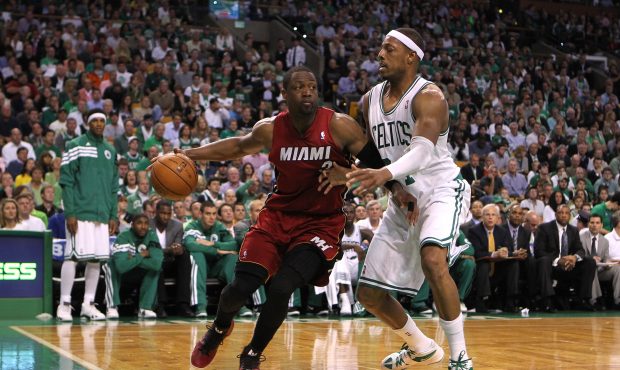 BOSTON, MA - JUNE 07: Dwyane Wade #3 of the Miami Heat drives against Paul Pierce #34 of the Boston...