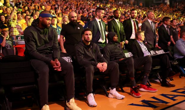 OAKLAND, CALIFORNIA - APRIL 15: DeMarcus Cousins #0, Klay Thompson #11, and Kevin Durant #35 of the...