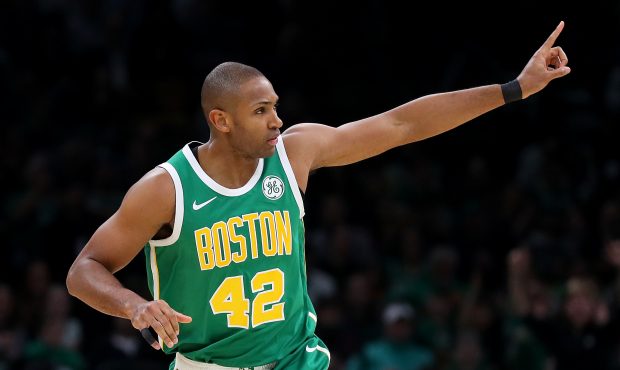 BOSTON, MASSACHUSETTS - MARCH 18: Al Horford #42 of the Boston Celtics celebrates after scoring aga...