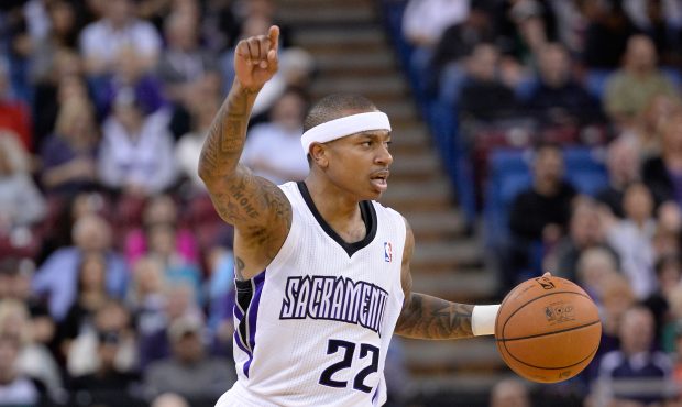 Isaiah Thomas of the Sacramento Kings calls out a play while running the offense during a game in 2...