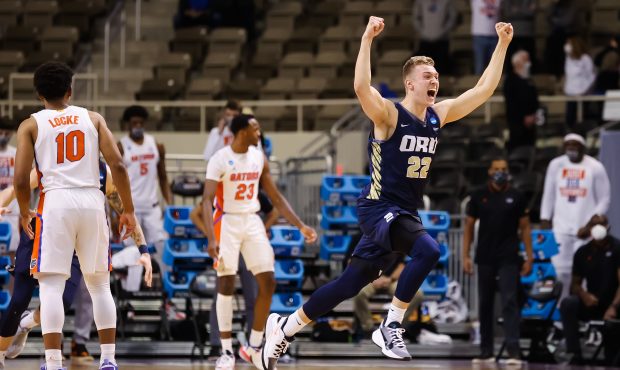 INDIANAPOLIS, IN - MARCH 21: Francis Lacis #22 of the Oral Roberts Golden Eagles celebrates the Eag...