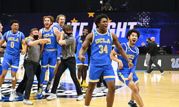 INDIANAPOLIS, IN - MARCH 30: The UCLA Bruins celebrate their win over the Michigan Wolverines in th...
