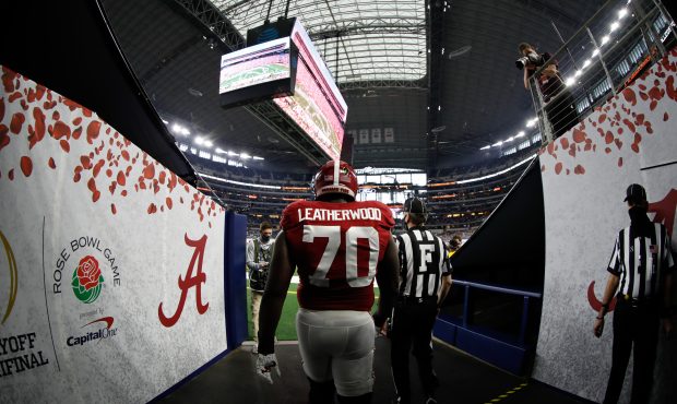 DALLAS, TX - JANUARY 1: Alex Leatherwood #70 of the Alabama Crimson Tide takes the field before the...