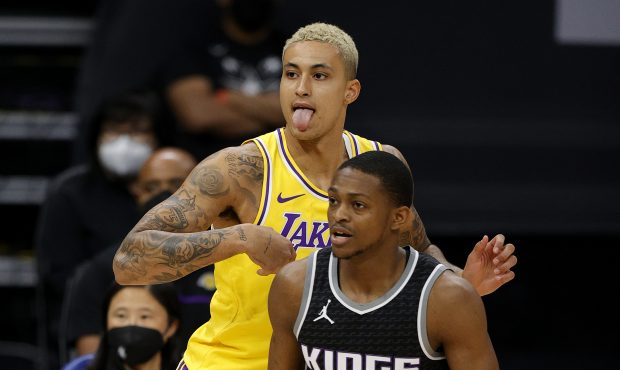 SACRAMENTO, CALIFORNIA - APRIL 02: Kyle Kuzma #0 of the Los Angeles Lakers reacts after he took a s...