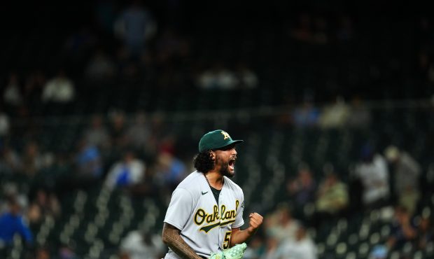 SEATTLE, WA - JUNE 02: Sean Manaea #55 of the Oakland Athletics celebrates the win after pitching a...