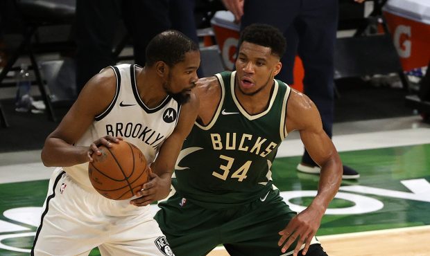 MILWAUKEE, WISCONSIN - MAY 02: Kevin Durant #7 of the Brooklyn Nets is defended by Giannis Antetoko...