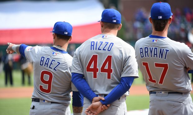 ARLINGTON, TX - MARCH 28: Javier Baez #9, Anthony Rizzo #44 and Kris Bryant #17 of the Chicago Cubs...