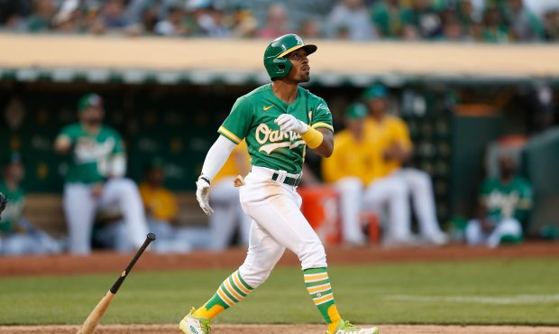 OAKLAND, CALIFORNIA - AUGUST 29: Tony Kemp #5 of the Oakland Athletics hits a two-run home run in t...