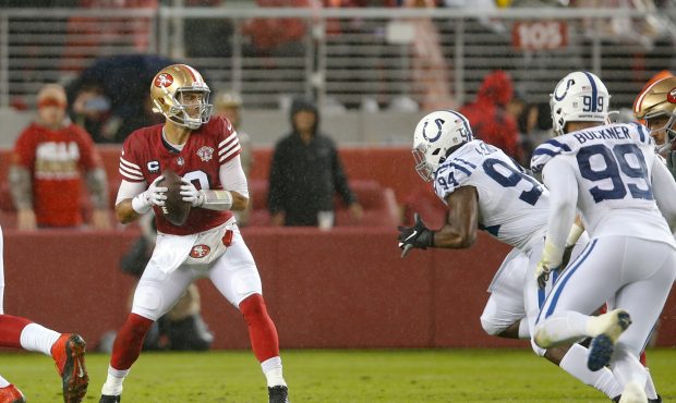 Jimmy Garoppolo #10 of the San Francisco 49ers looks for a receiver during the game against the Ind...