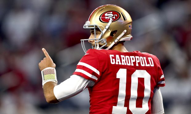 ARLINGTON, TEXAS - JANUARY 16: Jimmy Garoppolo #10 of the San Francisco 49ers reacts during the thi...