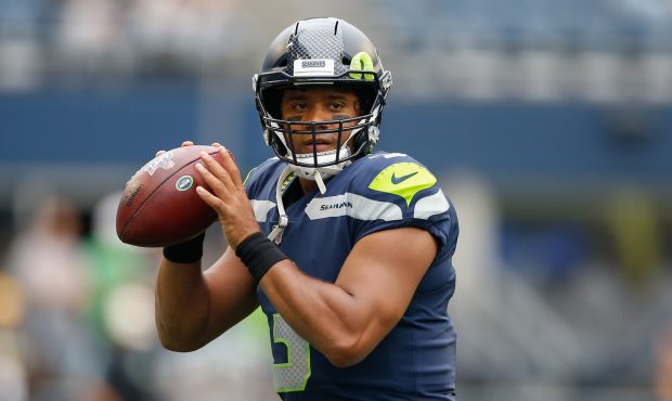 SEATTLE, WA - AUGUST 08: Quarterback Russell Wilson #3 of the Seattle Seahawks warms up prior to th...