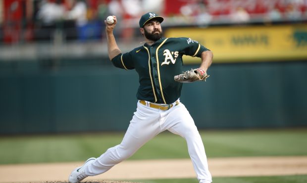 OAKLAND, CA - SEPTMEBER 25: Lou Trivino #62 of the Oakland Athletics pitches during the game agains...