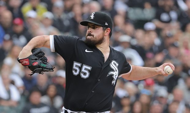 CHICAGO, ILLINOIS - OCTOBER 12: Starting pitcher Carlos Rodon #55 of the Chicago White Sox delivers...