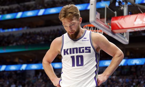 DALLAS, TEXAS - MARCH 05: Domantas Sabonis #10 of the Sacramento Kings reacts after a foul in the g...