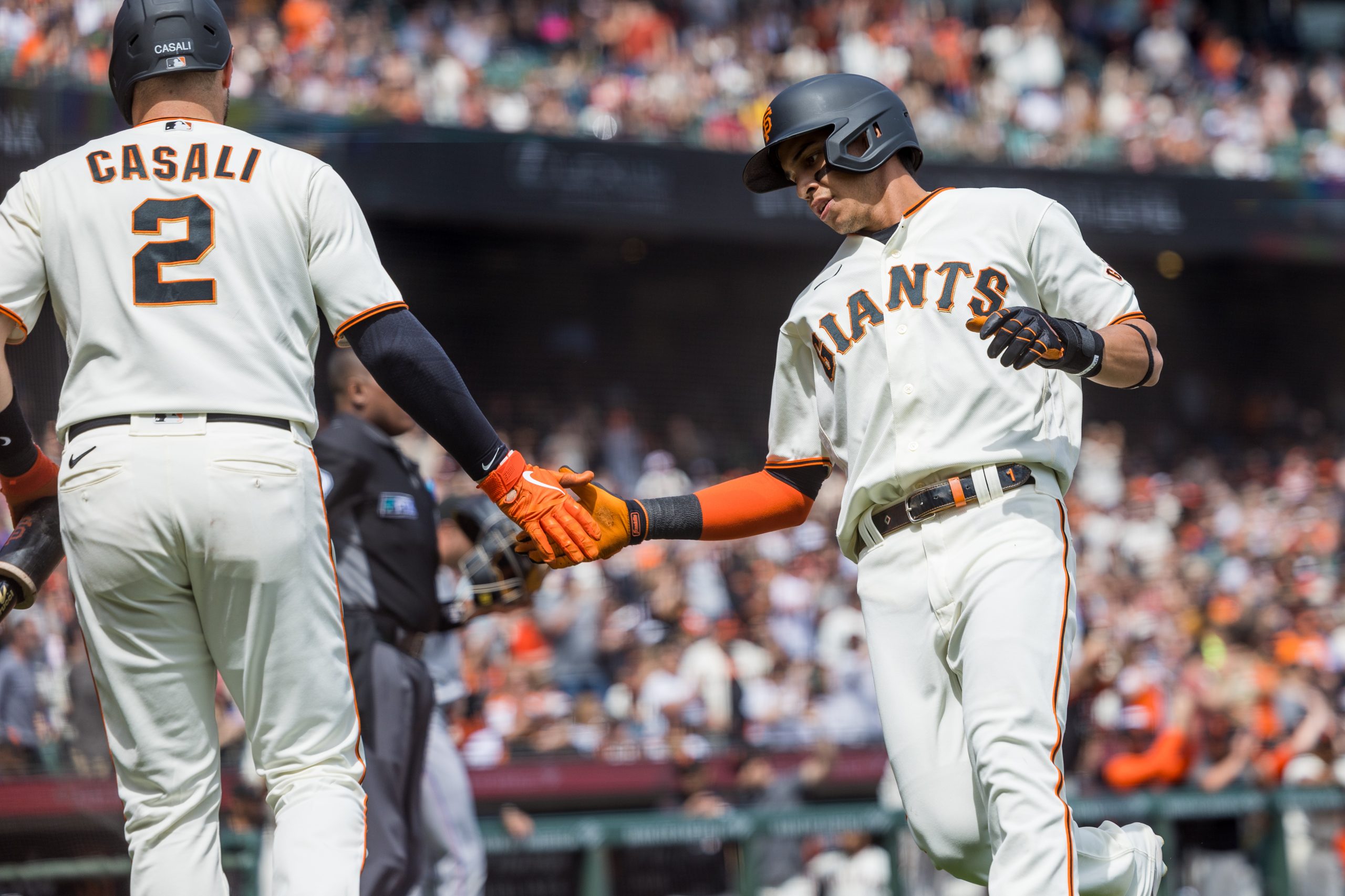 Brandon Belt captain of the ceremonial first pitch at Giants' opener