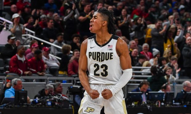 INDIANAPOLIS, INDIANA - MARCH 12: Jaden Ivey #23 of the Purdue Boilermakers reacts after making a b...