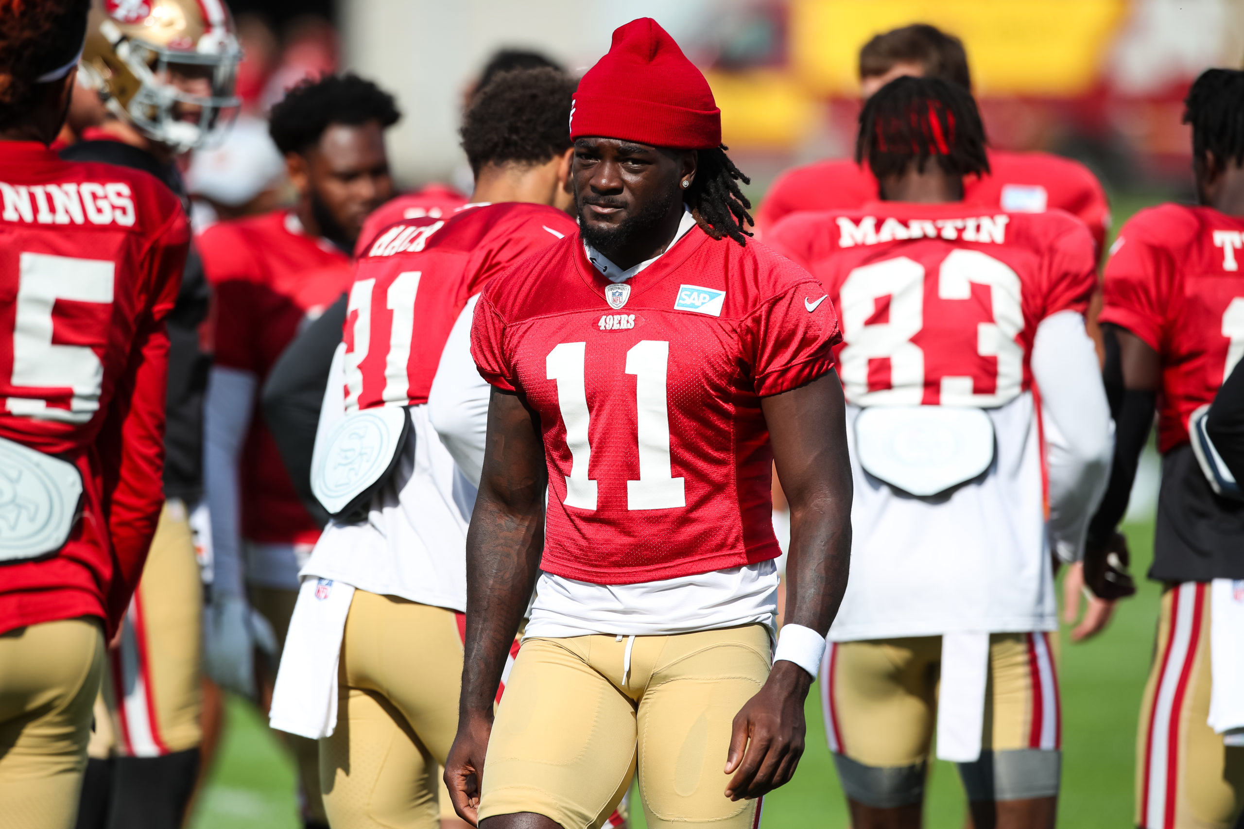 Brandon Aiyuk #11 of the San Francisco 49ers looks on during a joint practice with the Minnesota Vi...