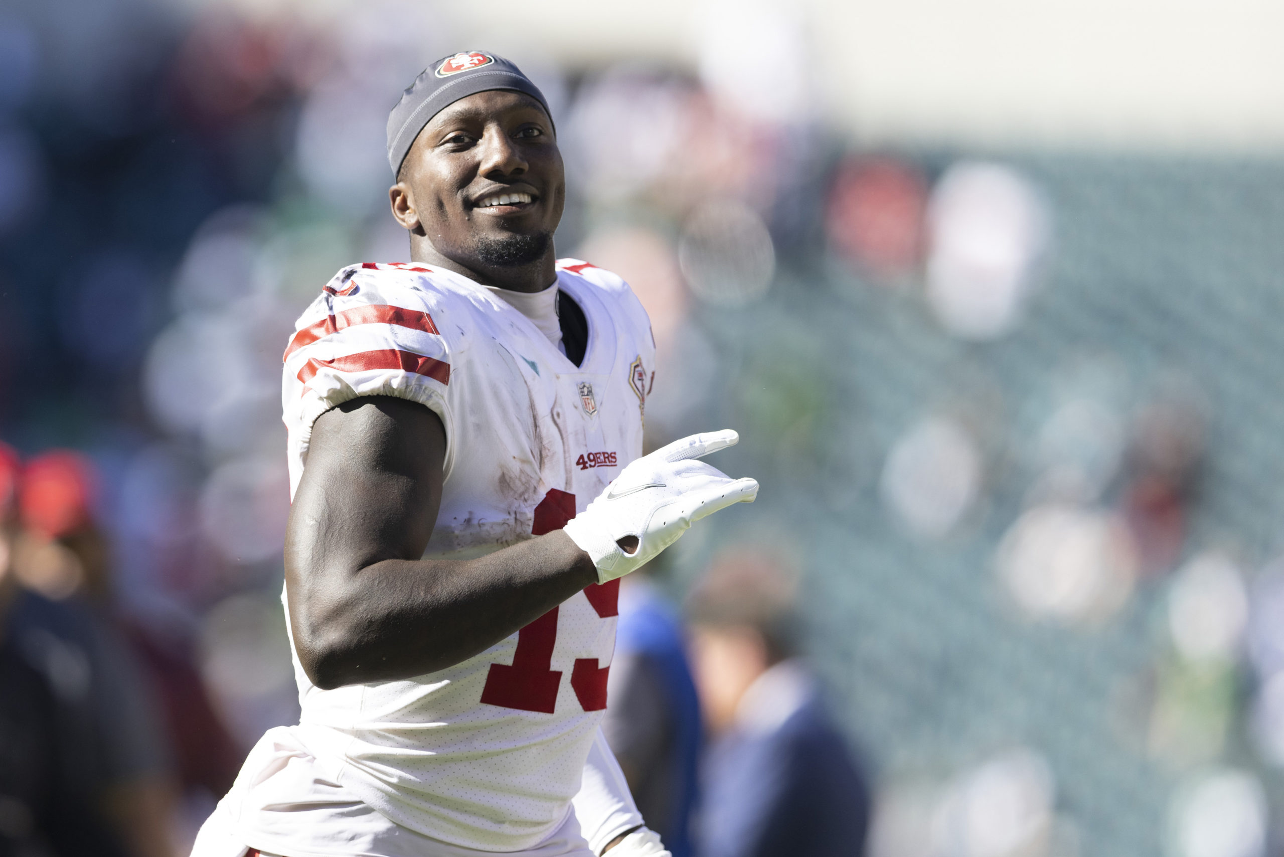 Deebo Samuel #19 of the San Francisco 49ers smiles after the game against the Philadelphia Eagles a...