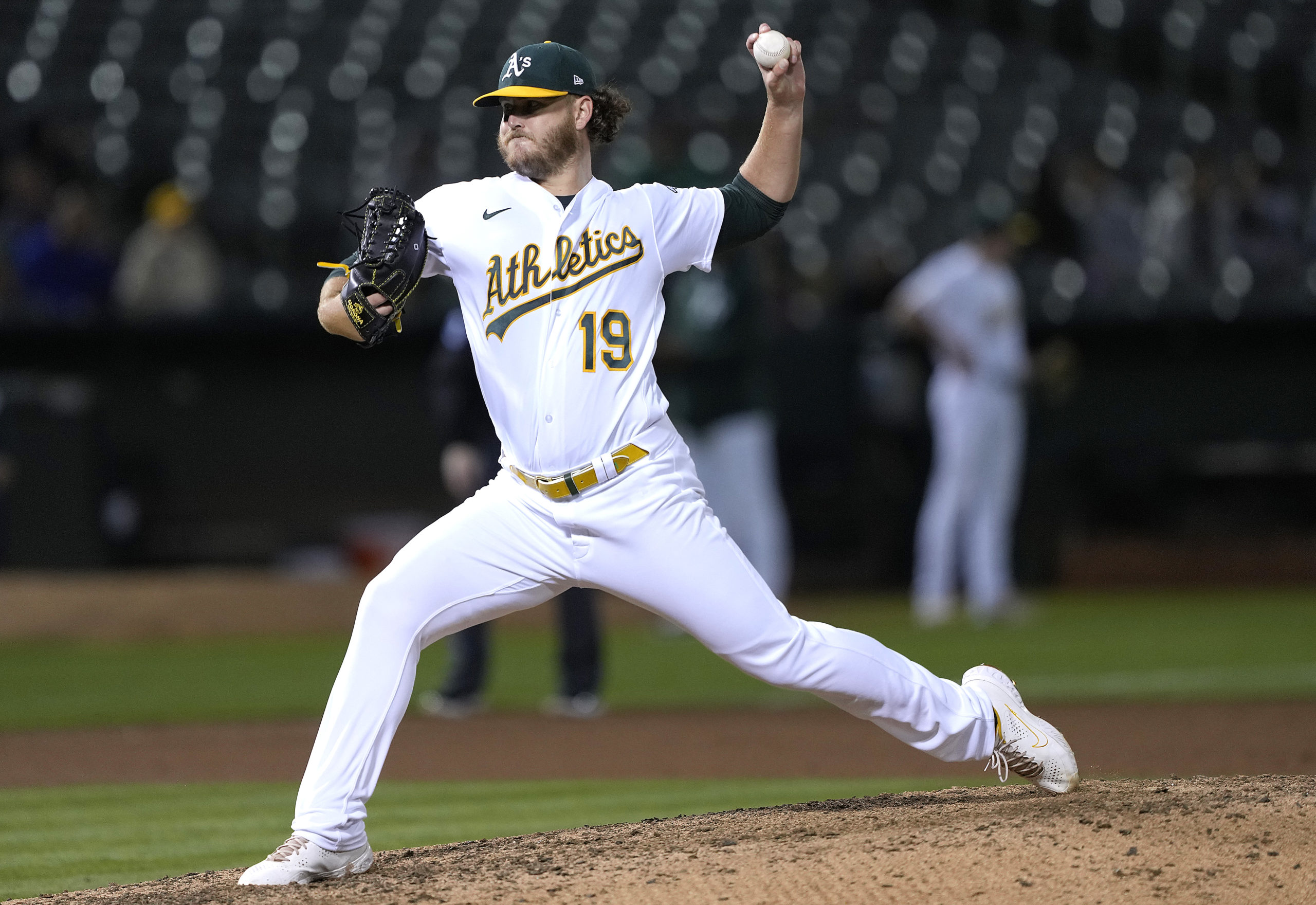 Cole Irvin of the Oakland Athletics pitches against the Los Angeles Angels in the top of the eighth...