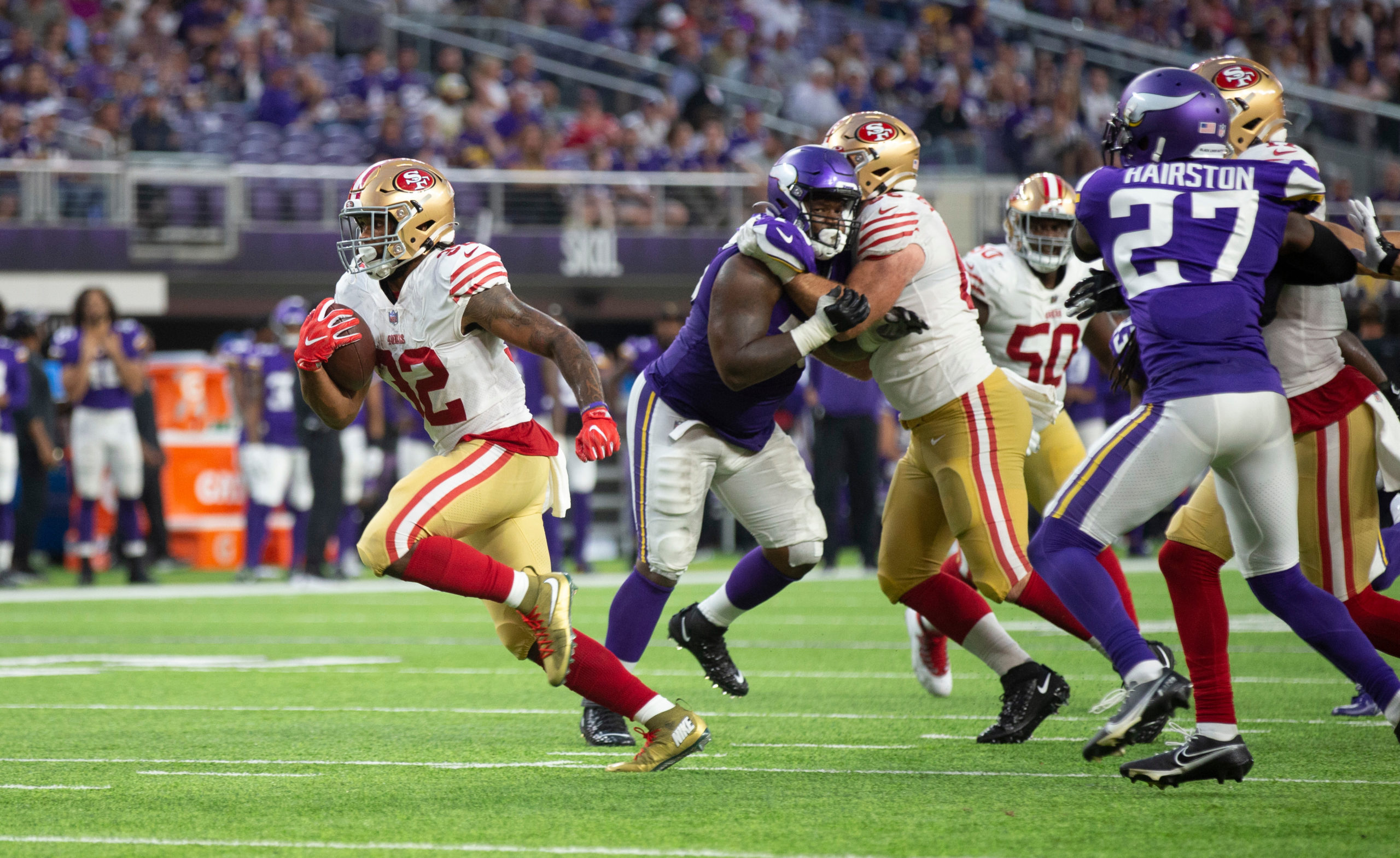 MINNEAPOLIS, MN - AUGUST 20: Tyrion Davis-Price #32 of the San Francisco 49ers rushes during the ga...