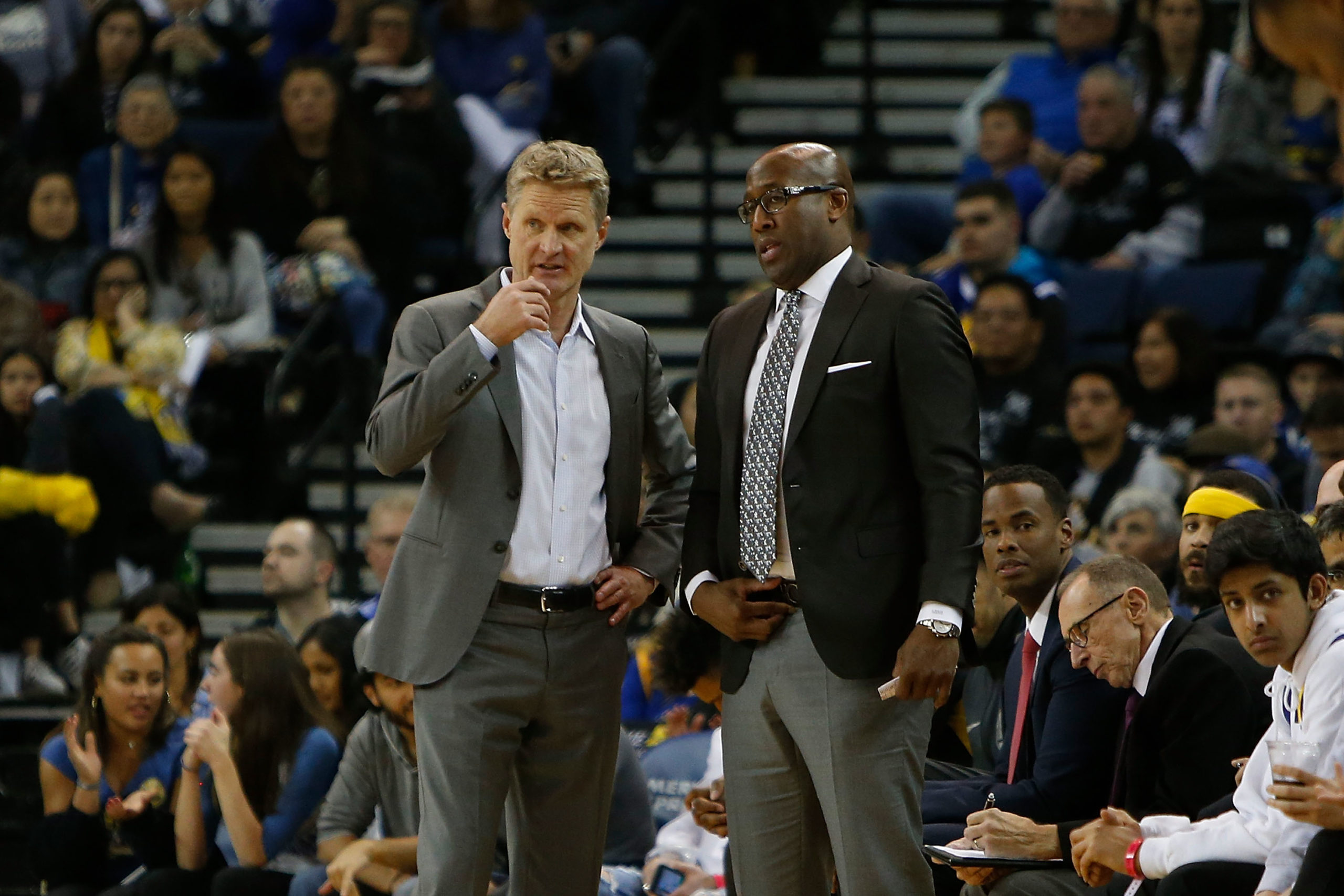 Steve Kerr and Mike Brown on the sidelines....