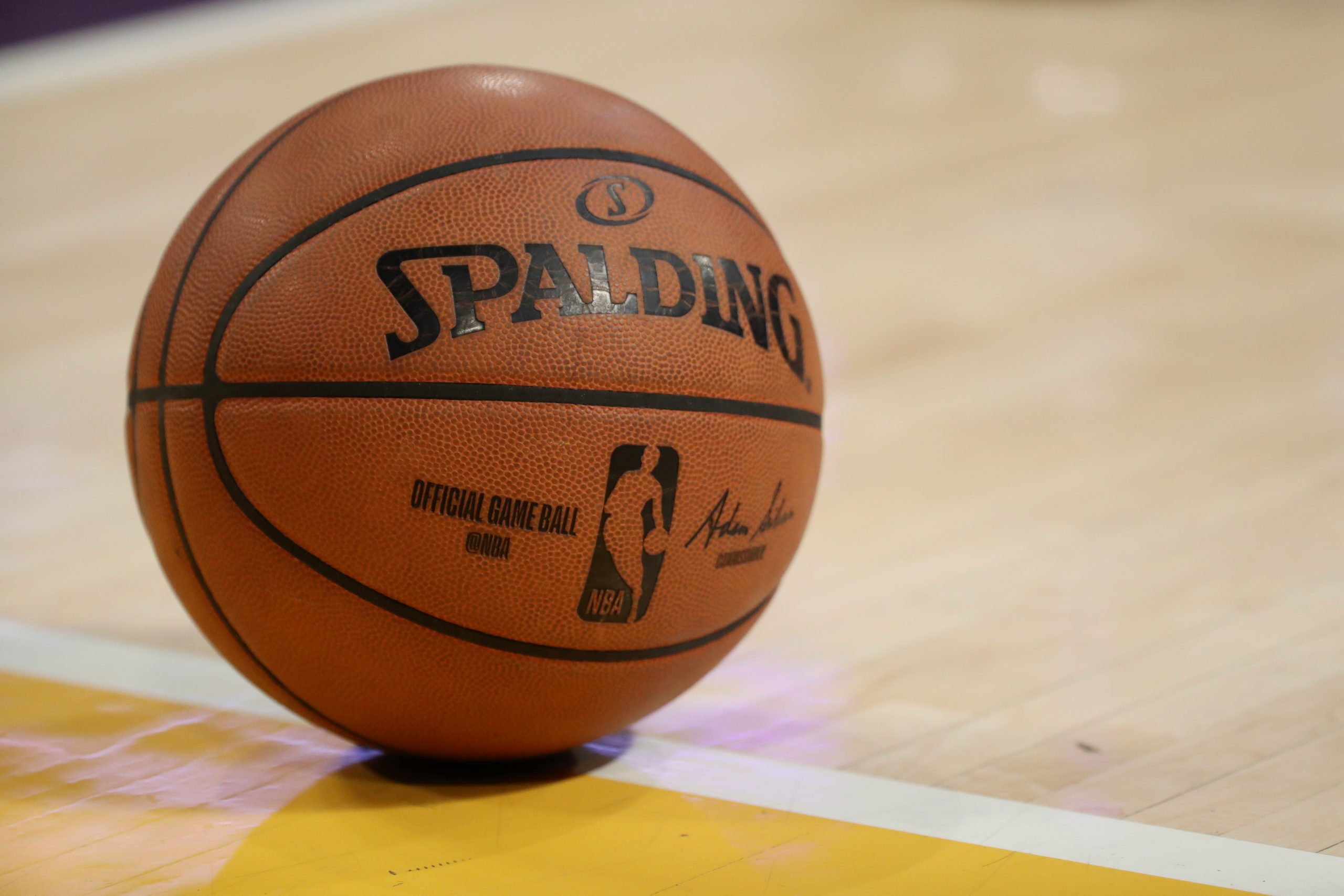 LOS ANGELES, CALIFORNIA - FEBRUARY 25: A detailed view of the Spalding basketball on the court duri...