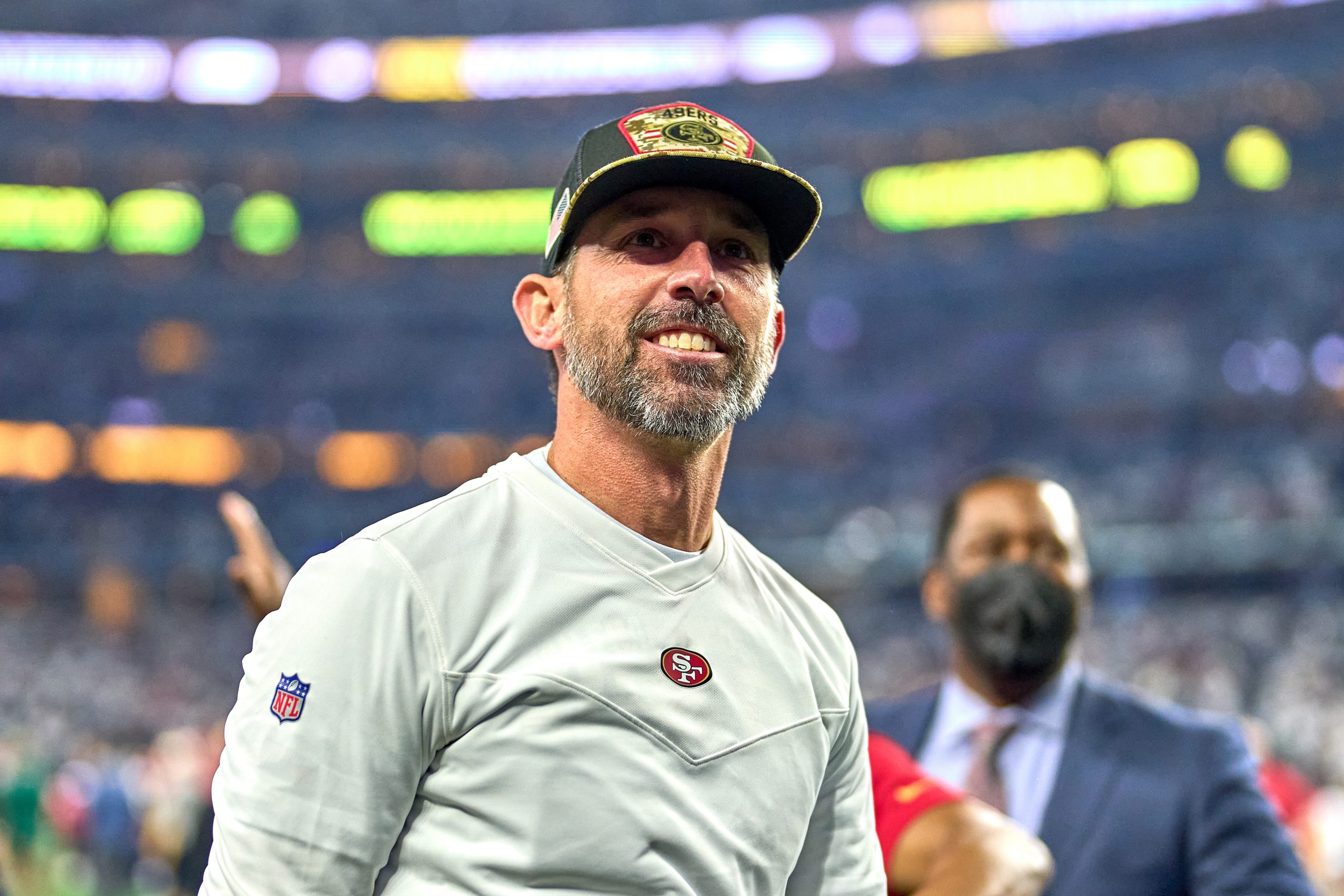 San Francisco 49ers head coach Kyle Shanahan celebrates with fans after the NFC Wild Card game betw...