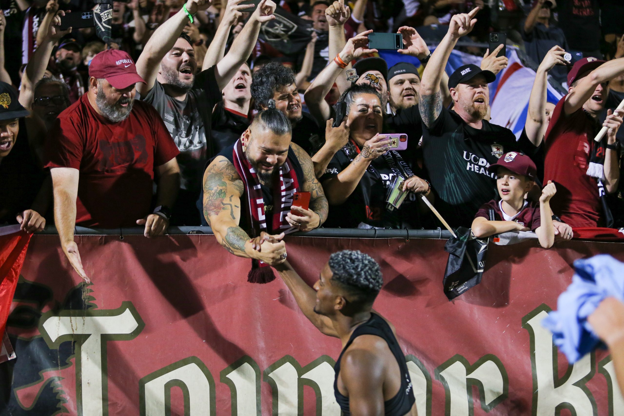 Douglas Martínez #42 of the Sacramento Republic FC celebrate with fans in the supporters' group, t...