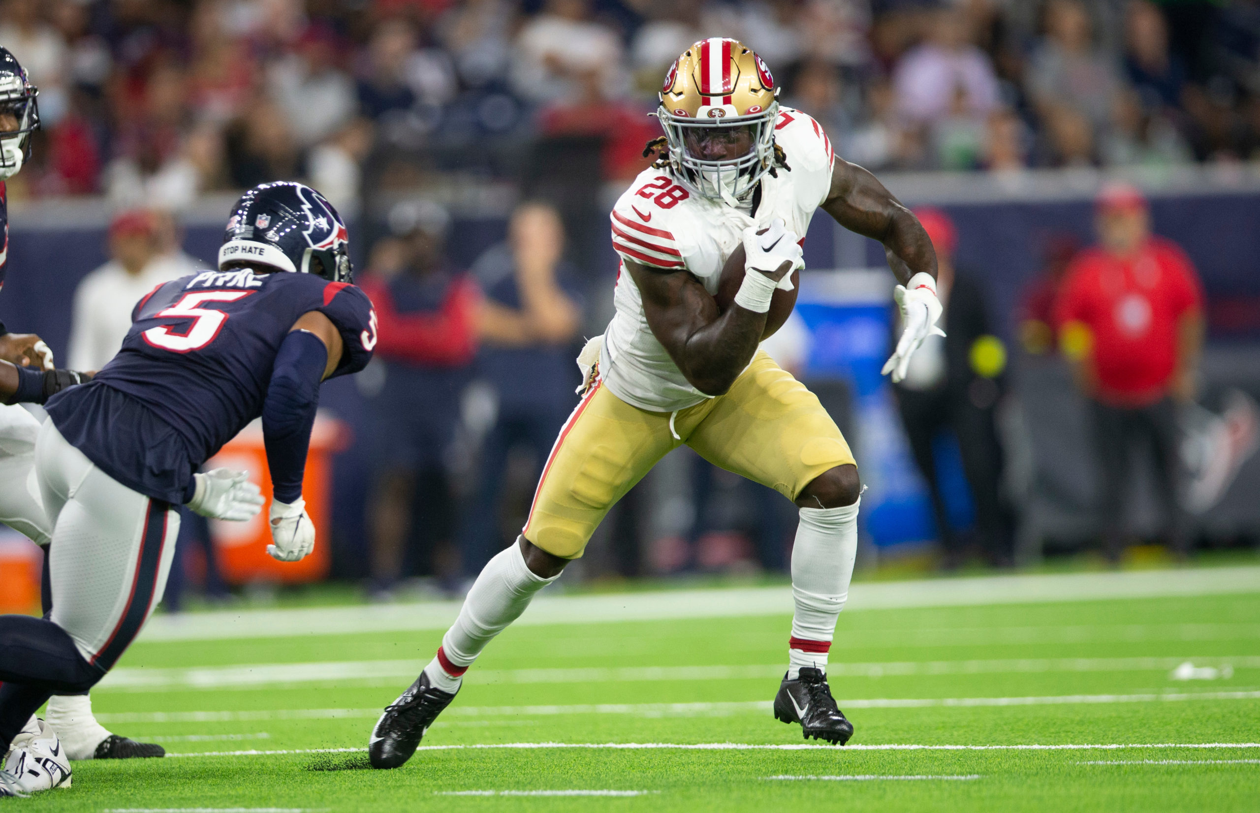 Trey Sermon #28 of the San Francisco 49ers rushes during the game against the Houston Texans at NRG...