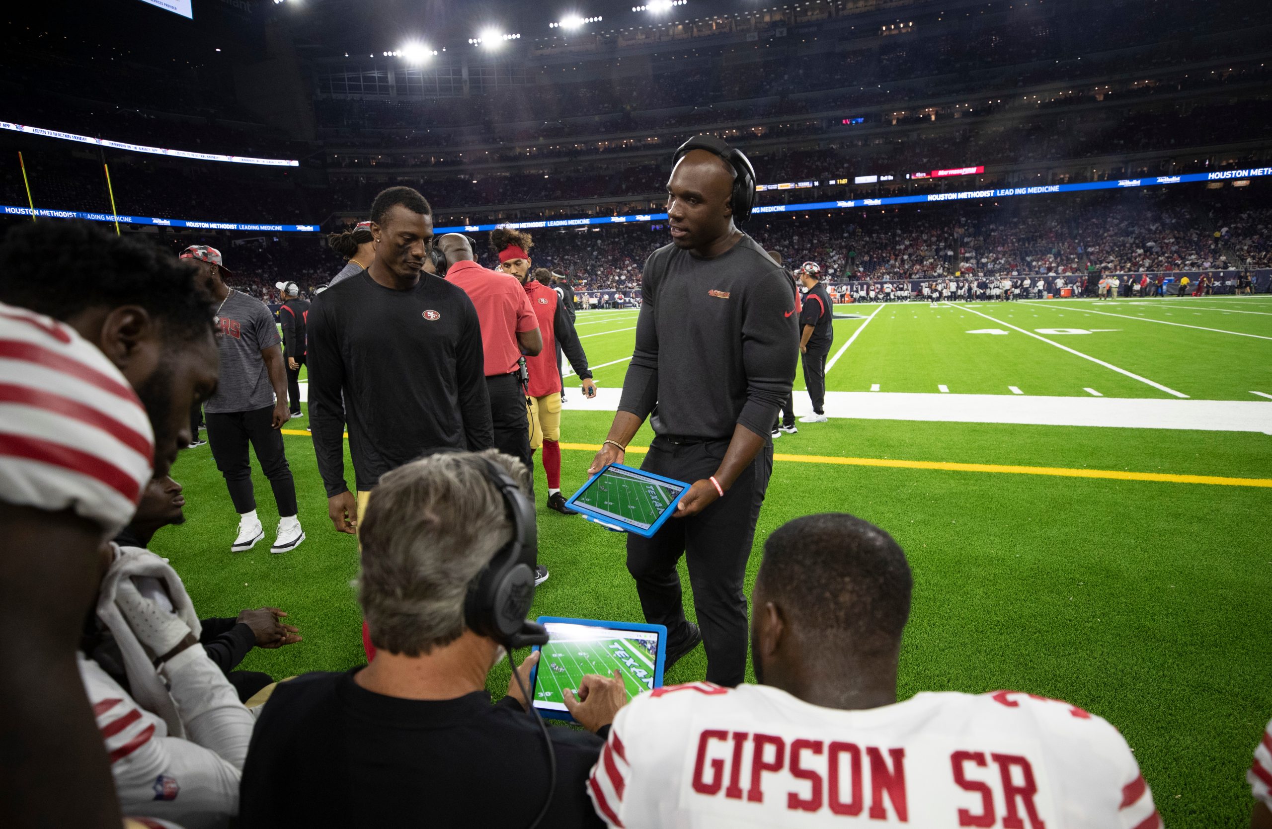 Defensive Coordinator DeMeco Ryans of the San Francisco 49ers talks with the defense on the sidelin...