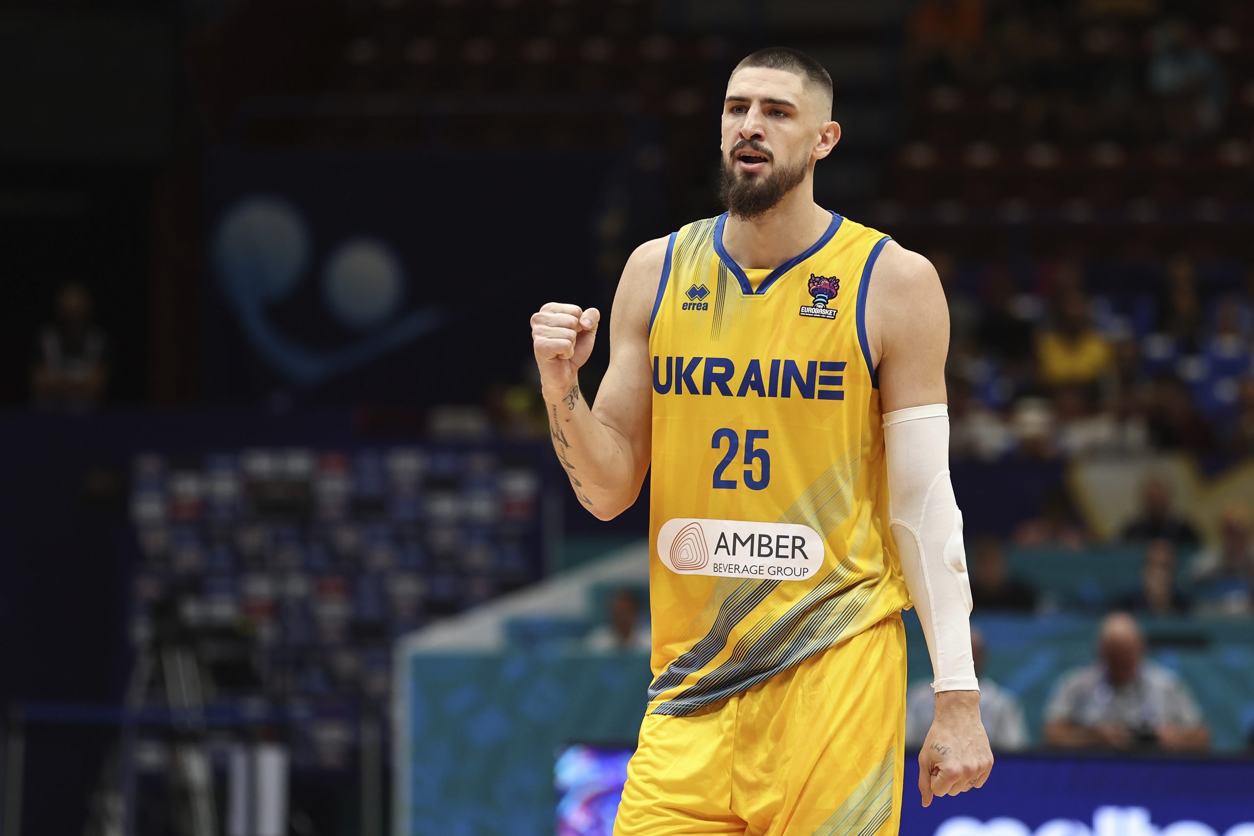 MILAN, ITALY - SEPTEMBER 02: Alex Len #25 of Ukraine celebrates during the FIBA EuroBasket 2022 gro...