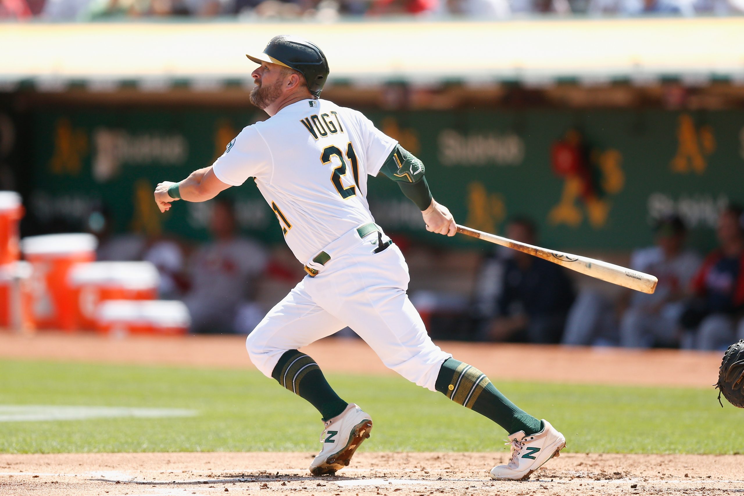 OAKLAND, CALIFORNIA - SEPTEMBER 07: Stephen Vogt #21 of the Oakland Athletics hits a RBI double in ...