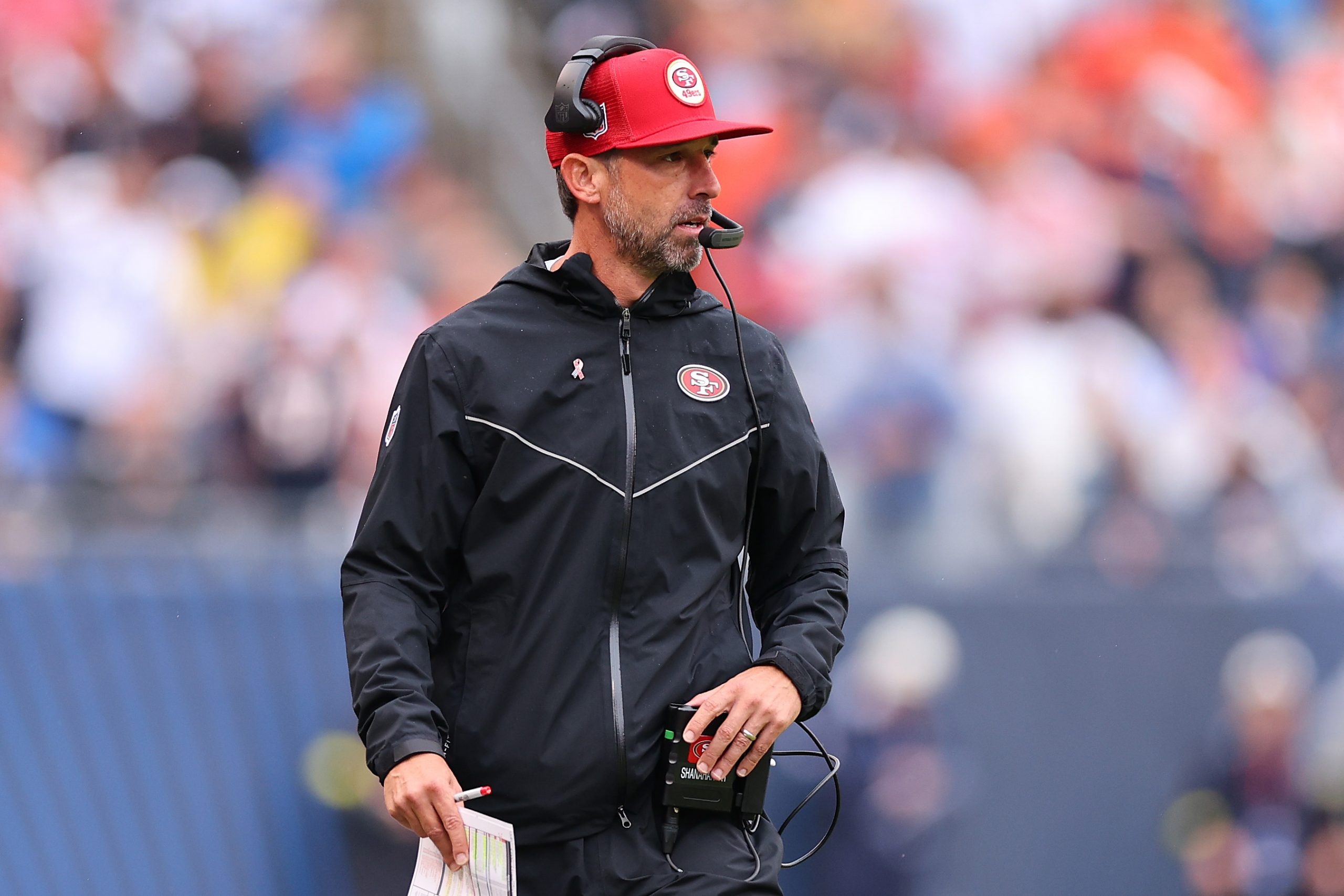 Head coach Kyle Shanahan of the San Francisco 49ers looks on against the Chicago Bears at Soldier F...