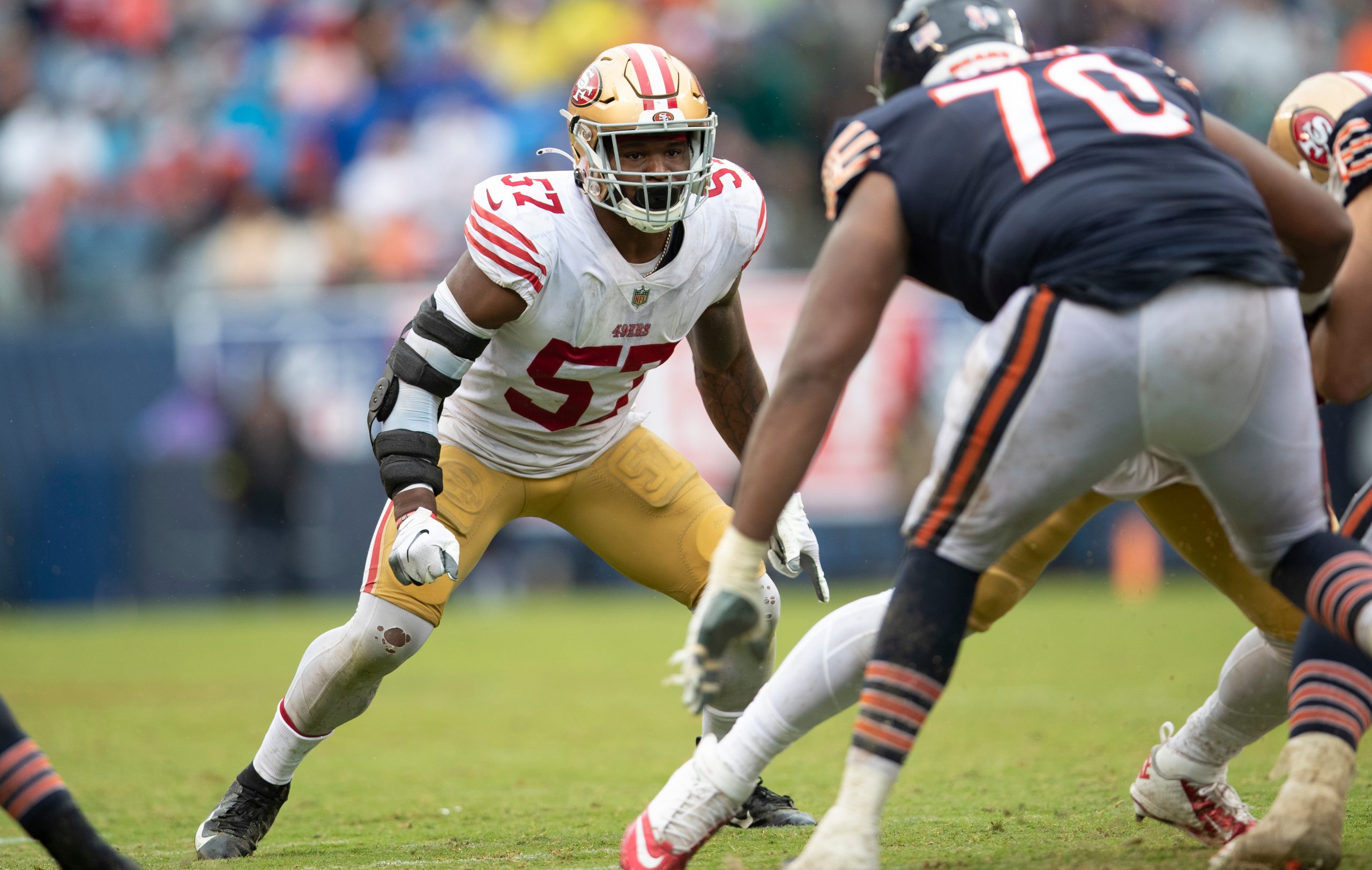 Dre Greenlaw #57 of the San Francisco 49ers defends during the game against the Chicago Bears at So...