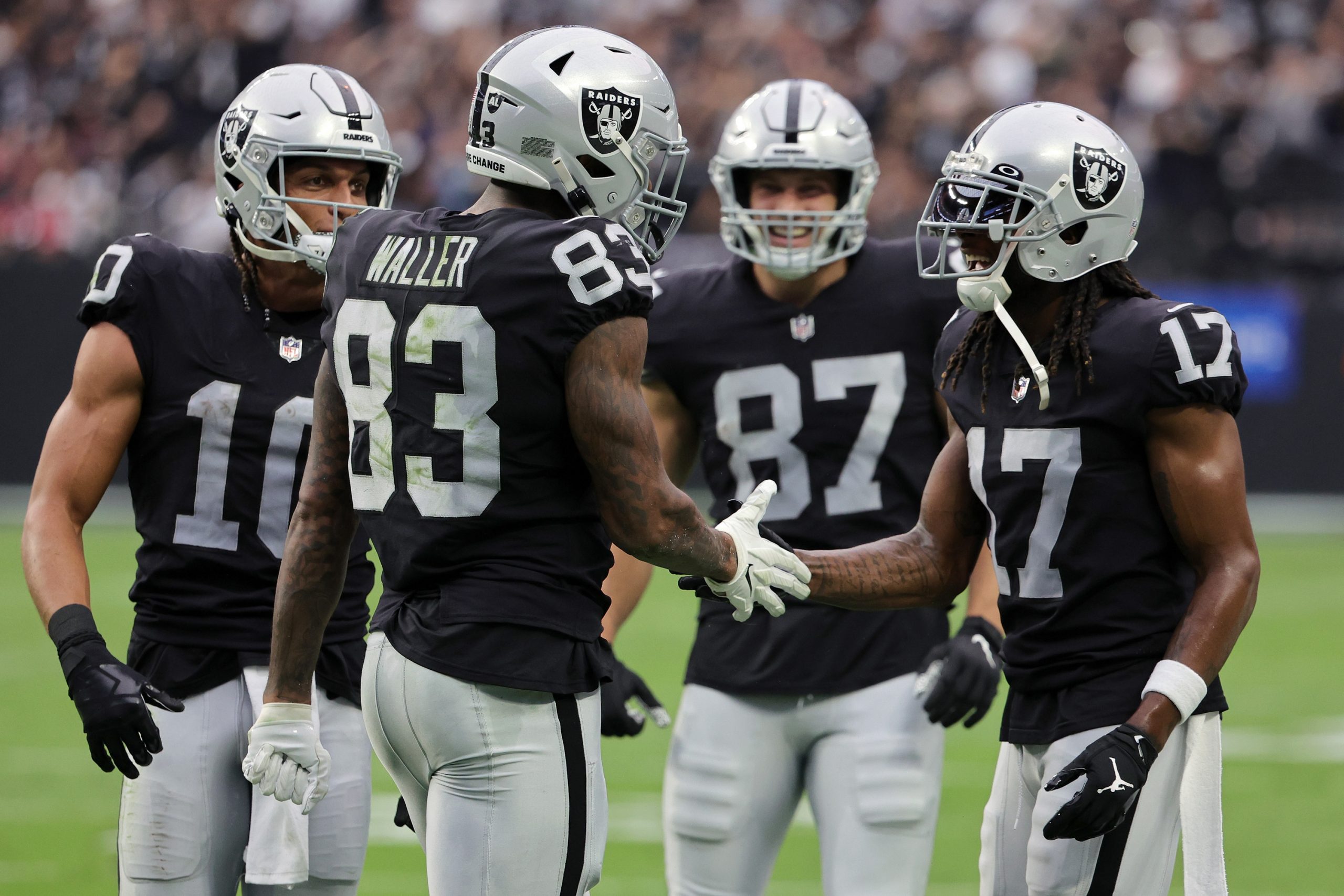 Darren Waller #83 of the Las Vegas Raiders celebrates with teammates after a touchdown in the secon...