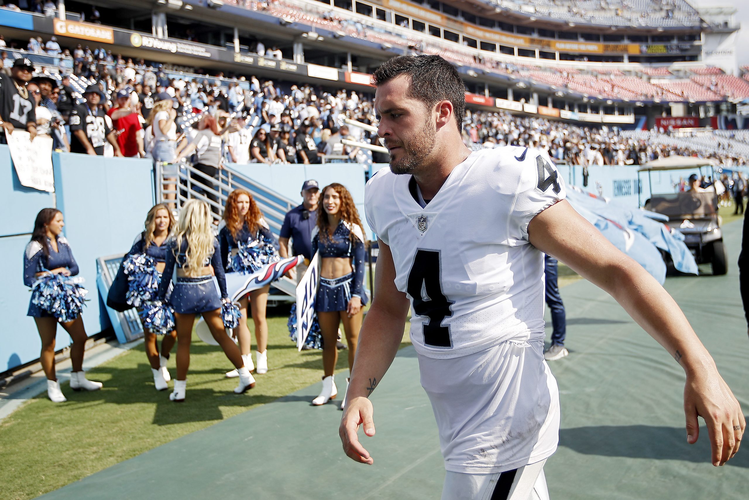 Derek Carr #4 of the Las Vegas Raiders walks off the field after the game against the Tennessee Tit...