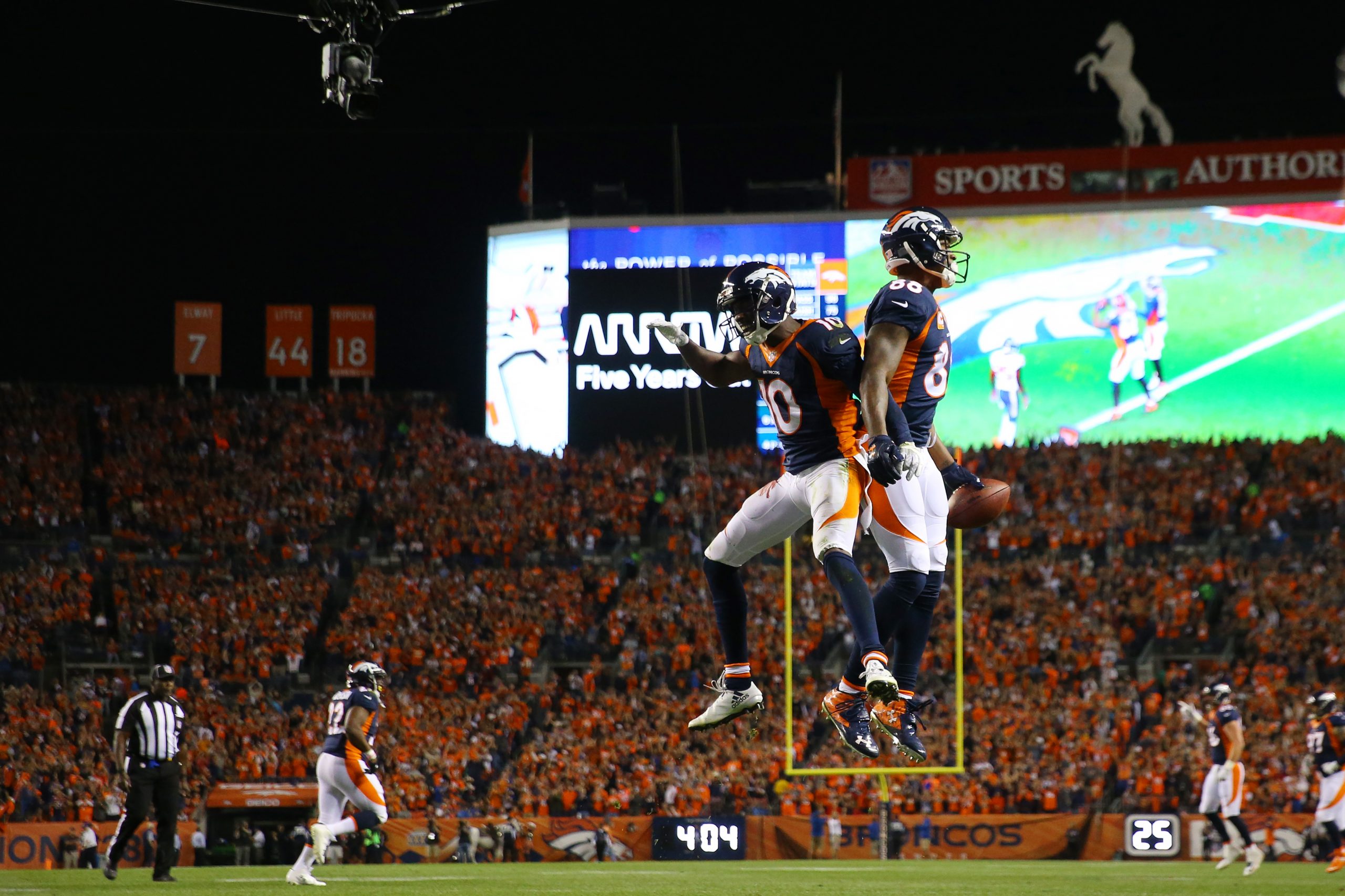 DENVER, CO - OCTOBER 24: Wide receiver Demaryius Thomas #88 of the Denver Broncos celebrate a touch...