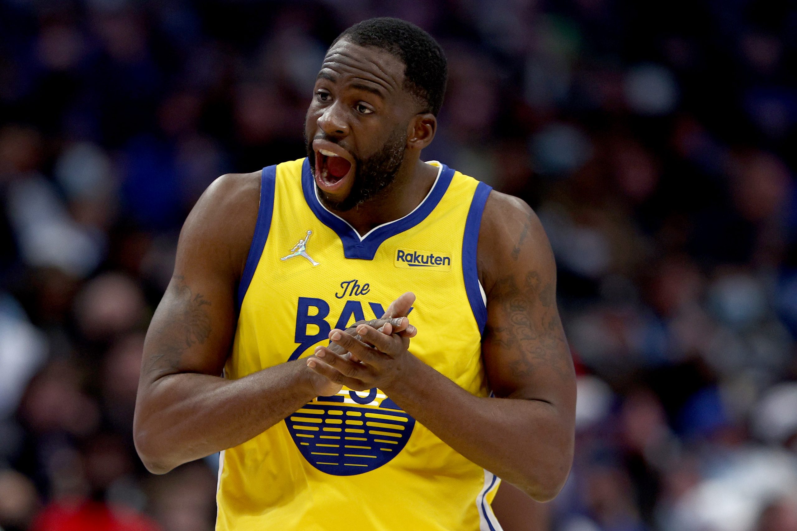 DALLAS, TEXAS - JANUARY 05: Draymond Green #23 of the Golden State Warriors reacts after being foul...