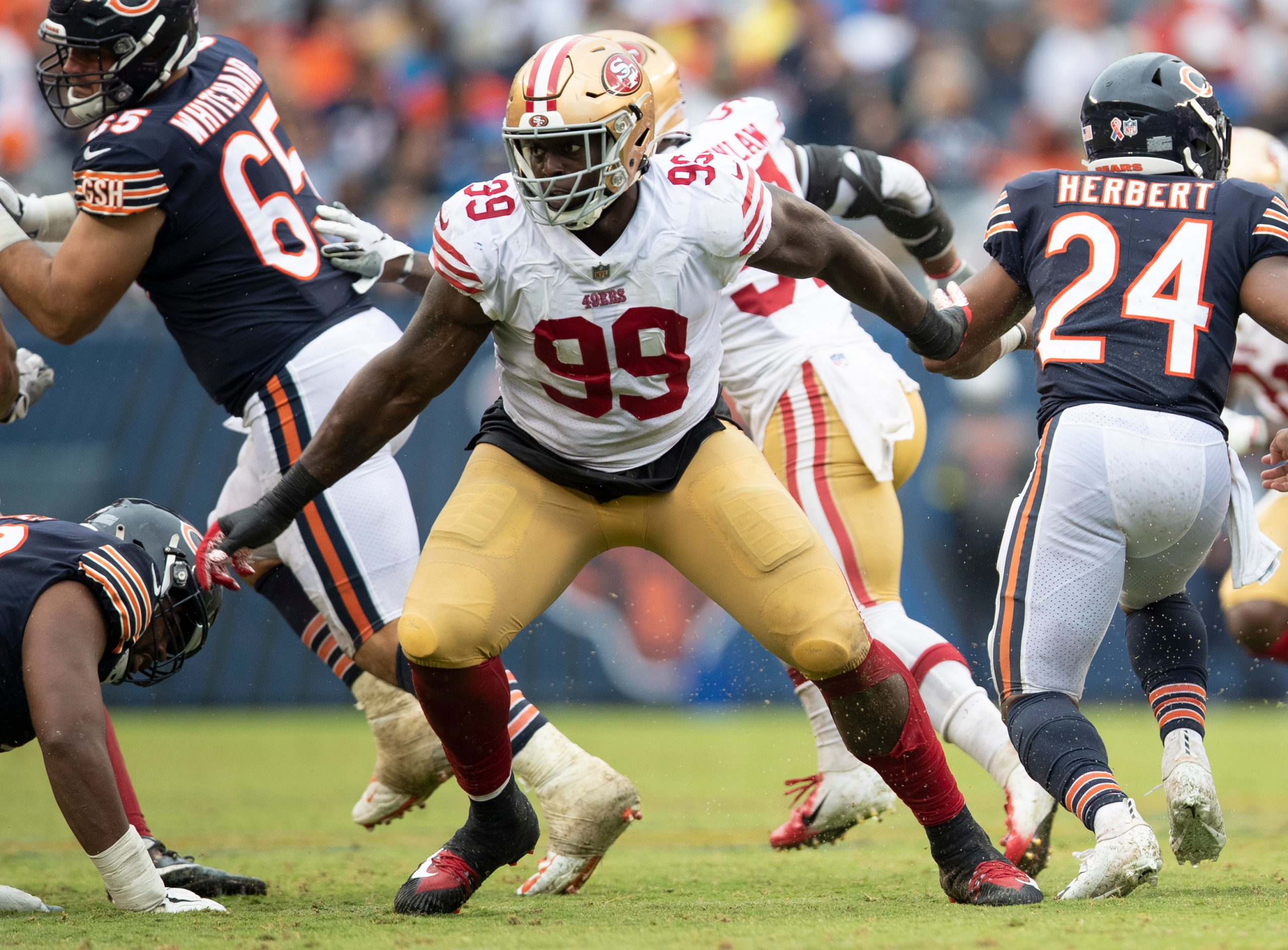Javon Kinlaw #99 of the San Francisco 49ers rushes the quarterback during the game against the Chic...
