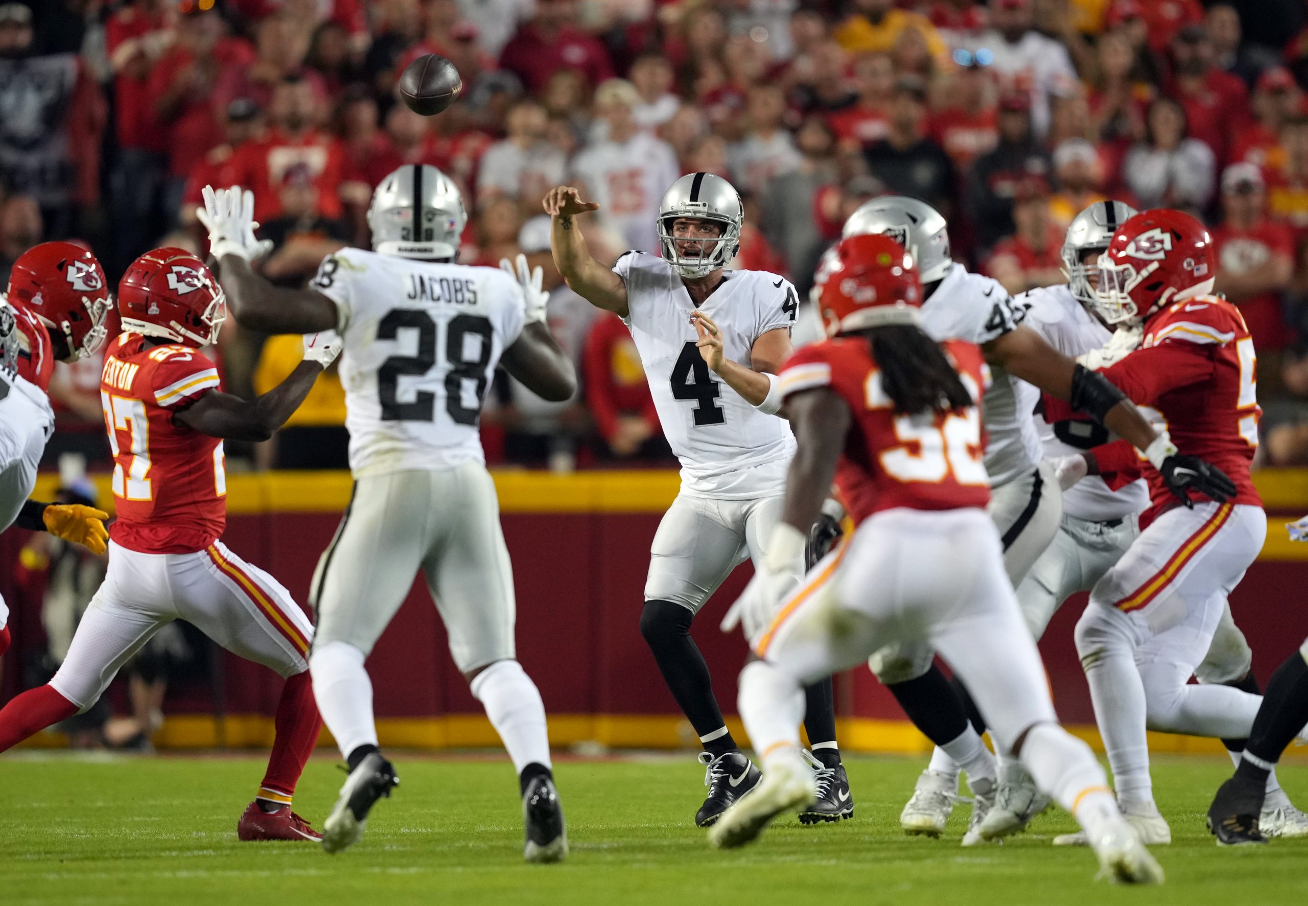 Derek Carr #4 of the Las Vegas Raiders passes during the 1st half of the game against the Kansas Ci...