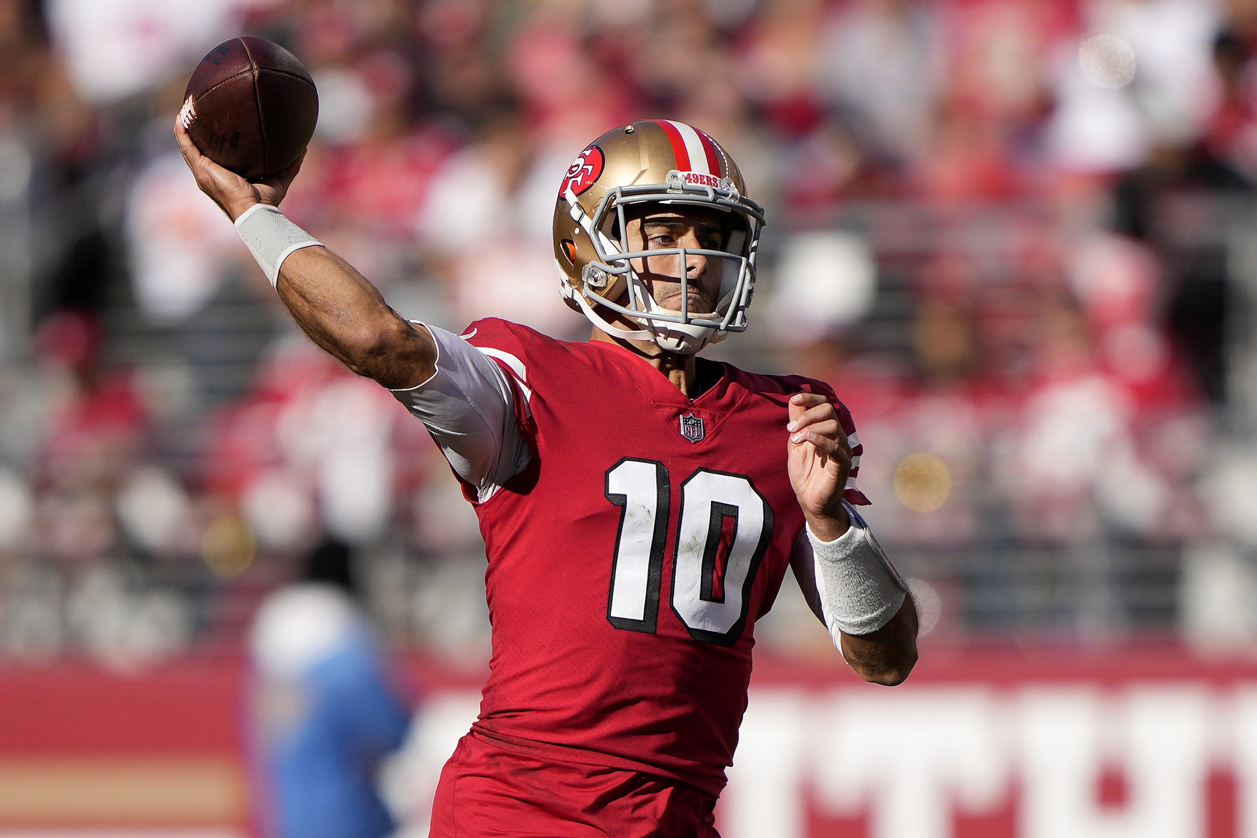 Jimmy Garoppolo #10 of the San Francisco 49ers throws a pass in the third quarter against the Kansa...